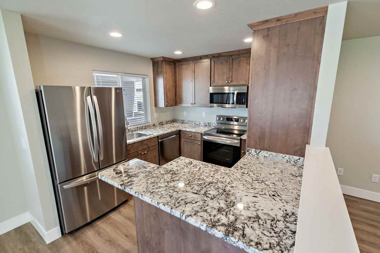 NEWER CONSTRUCTION IN TALENT; TRENTON SQUARE - Photo 2 of 39