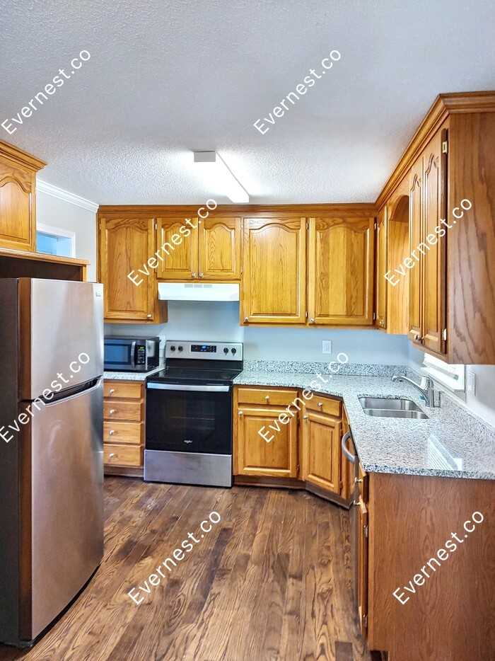 12008 E 56th St - Photo 2 of 22