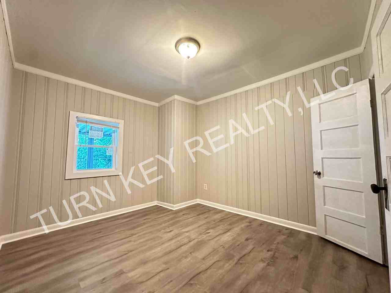 719 16th St N - Photo 7 of 15