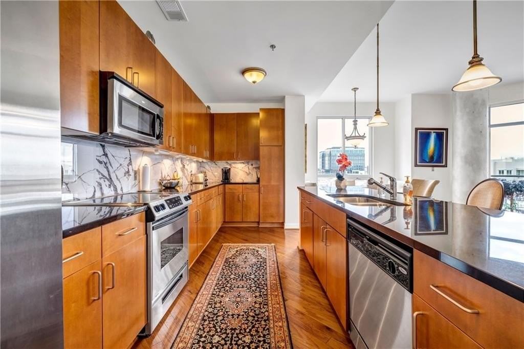 711 Cosmopolitan Dr Ne - Photo 4 of 50