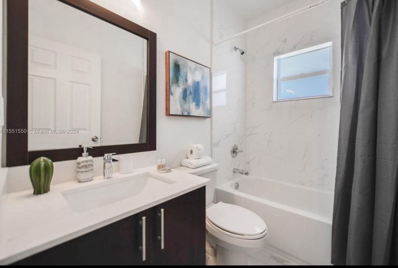 1987 NW 49th St - Photo 3 of 16