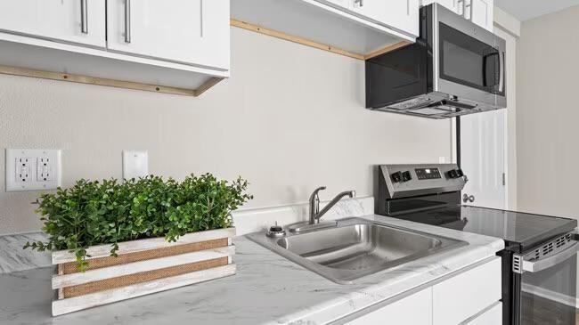 W 39th St - Photo 2 of 4