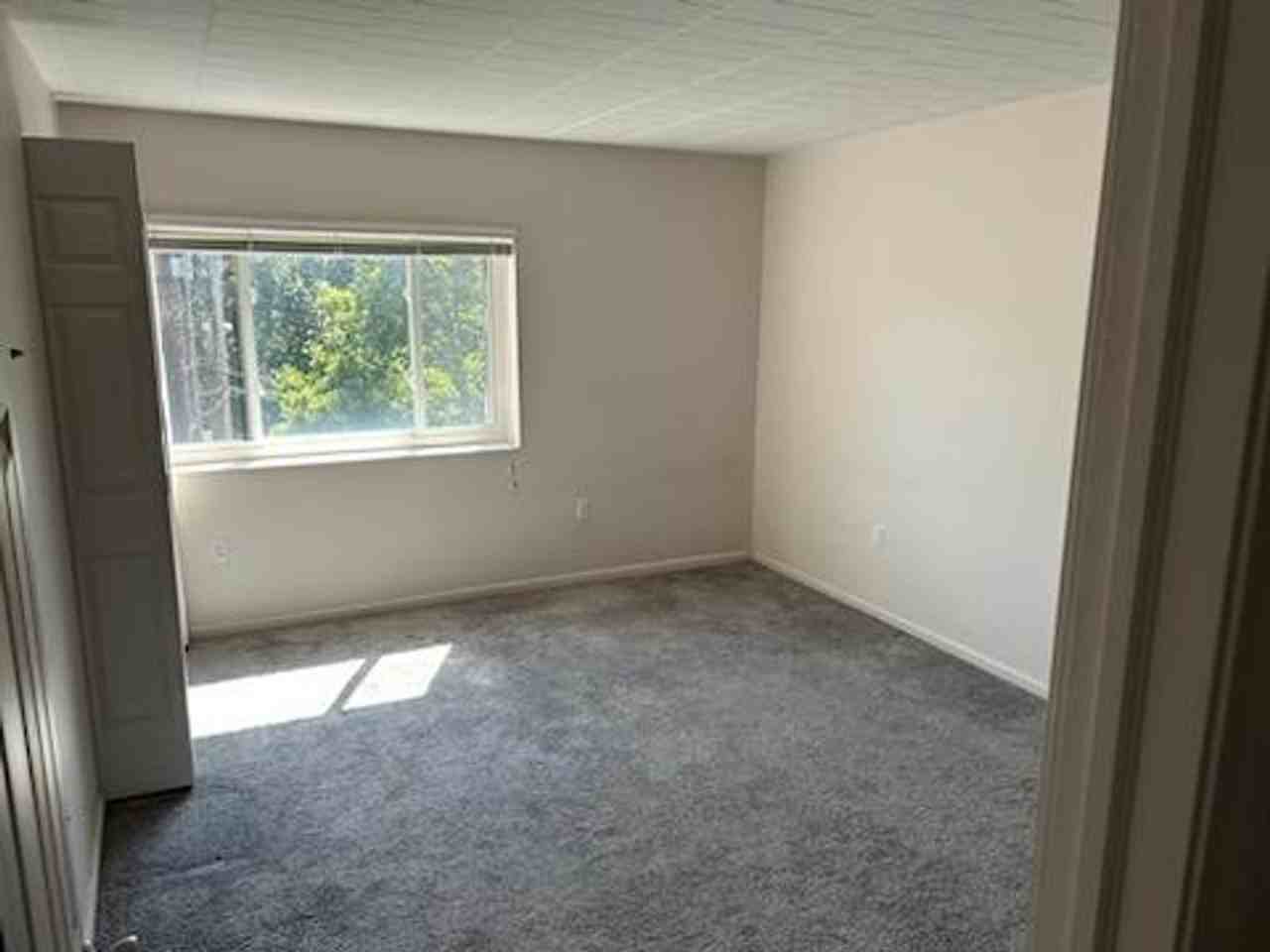 Carriage House Apartments - Photo 2 of 5