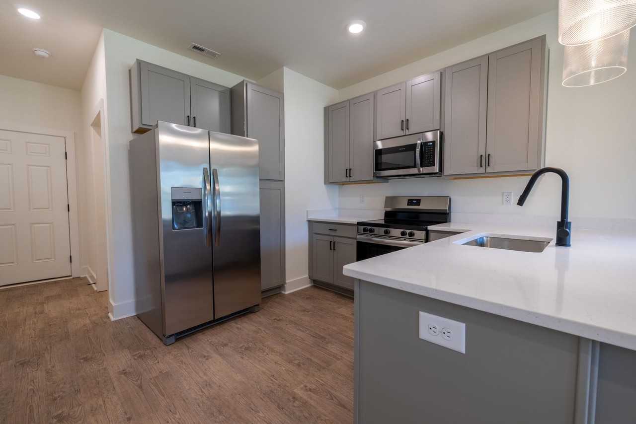 Brand New 2 Bed/2.5 Bath Townhomes at Green Leaf - Photo 7 of 20