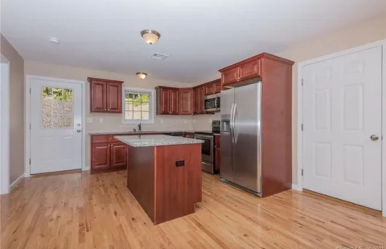 Inviting 55+ Community one bedroom plus large bonus den/office/guest room unit in Moodus - Photo 4 of 17