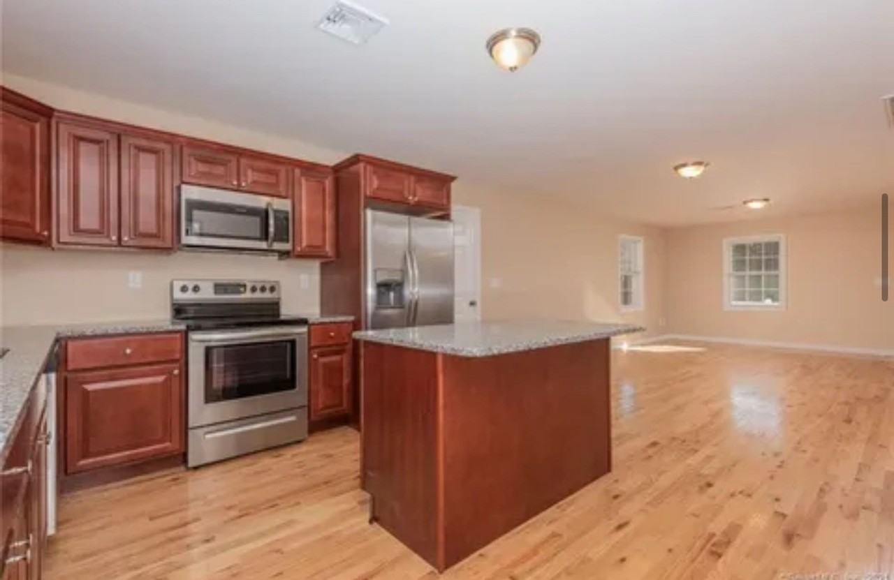 Inviting 55+ Community one bedroom plus large bonus den/office/guest room unit in Moodus - Photo 5 of 17