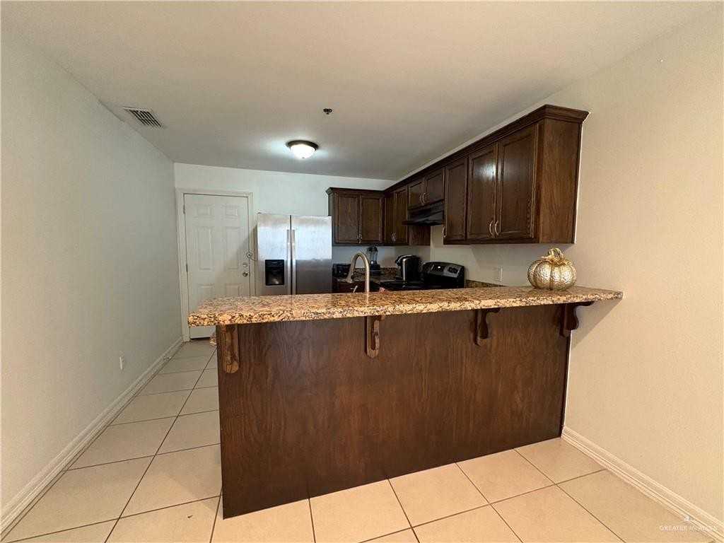 1301 W Kennedy St - Photo 5 of 12