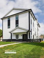 featured image of 415 E 10th St