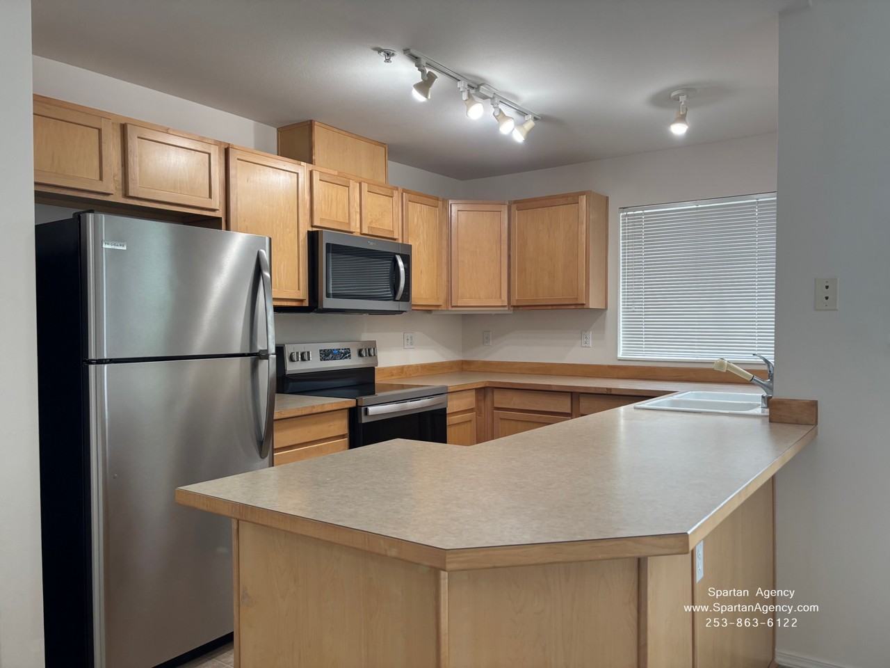 1039 61st St Se #104 - Photo 3 of 11