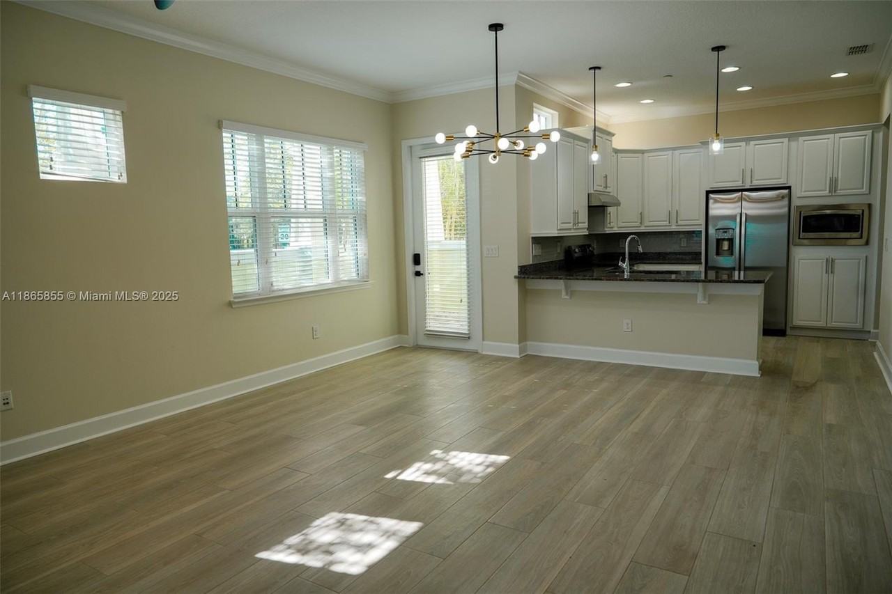 8282 Tavistock Lakes Blvd - Photo 4 of 30