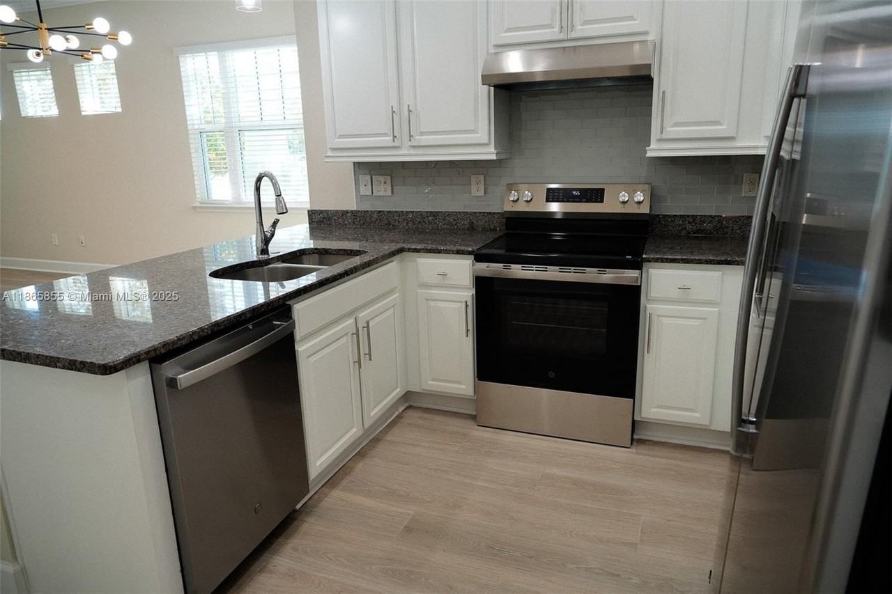 8282 Tavistock Lakes Blvd - Photo 6 of 30