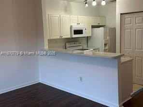 1555 Ne 33rd Rd #104-2 - Photo 6 of 19