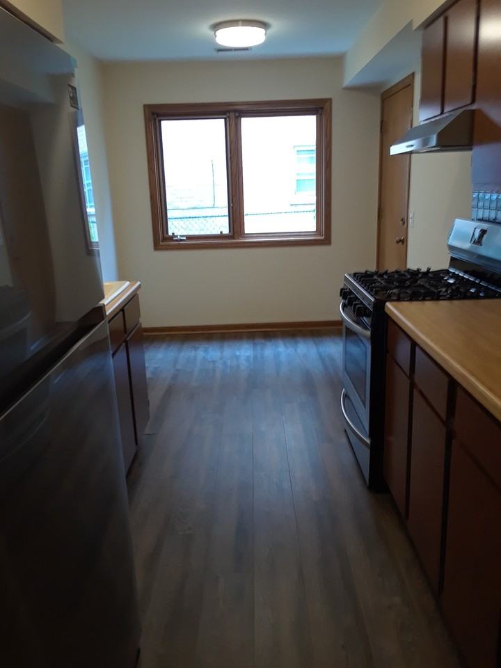 6596 North Ogallah Avenue #1B - Photo 5 of 16