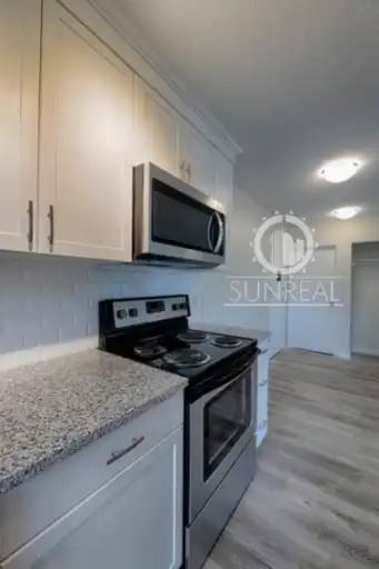 4616 57 St #102 - Photo 3 of 7
