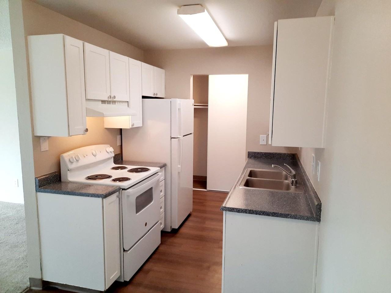 SUNDANCER APARTMENTS - Photo 3 of 14