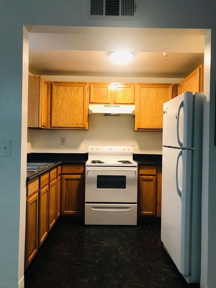 Victor Clothing Apartments - Photo 2 of 8