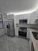 1228 S Military Trl #2114 - Photo 1 of 1