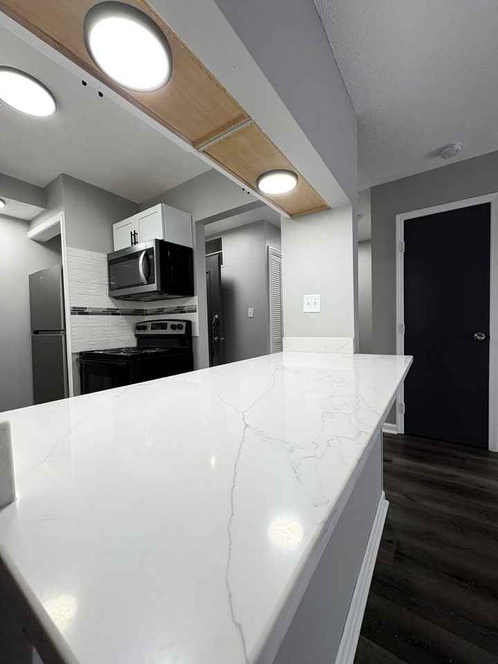 1240 W 73rd St - Photo 5 of 22