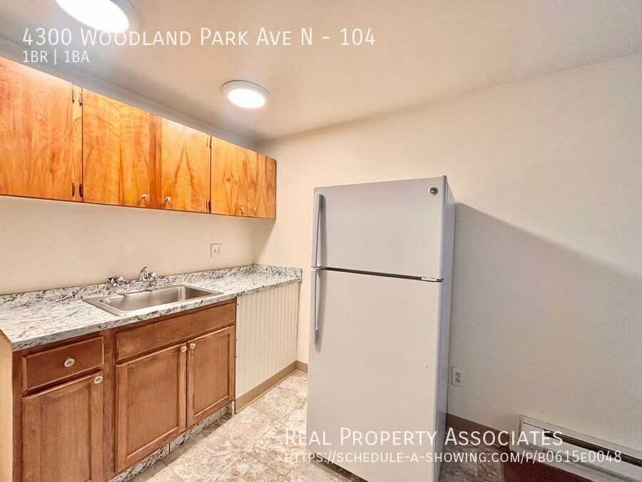 4300 Woodland Park Avenue North #104 - Photo 6 of 15