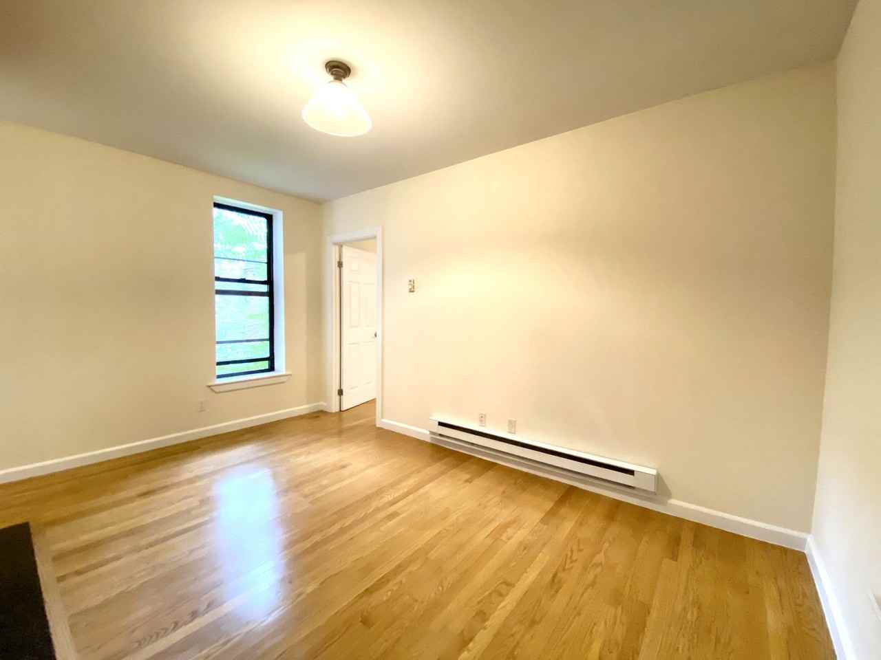 Mott St #12R - Photo 2 of 7