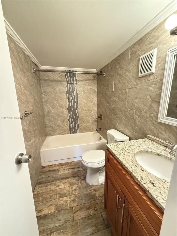 1798 Northwest 55th Avenue #203 - Photo 4 of 8