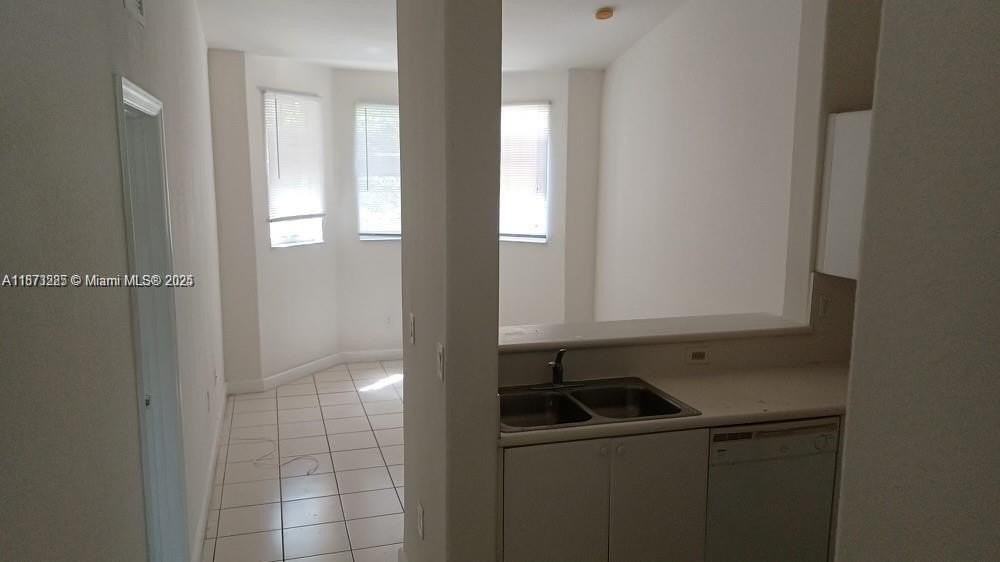 1666 Se 27th Ct #203