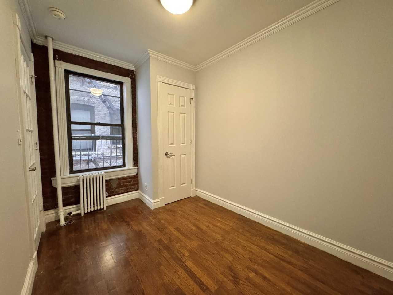 E 13th St #2C - Photo 6 of 6