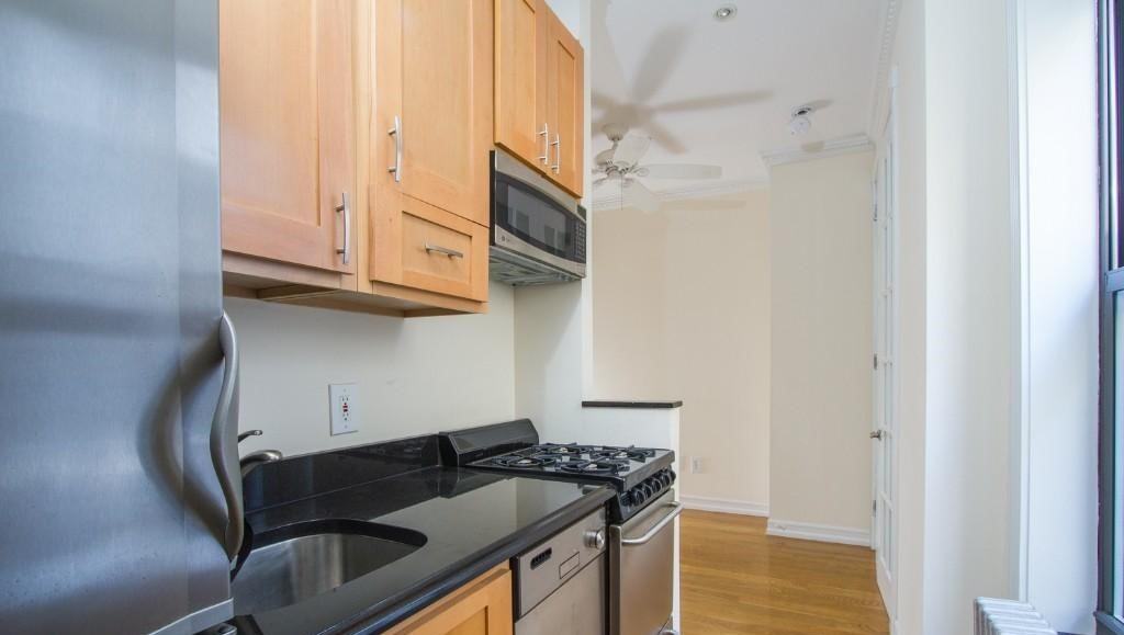 E 13th St #5A - Photo 3 of 7