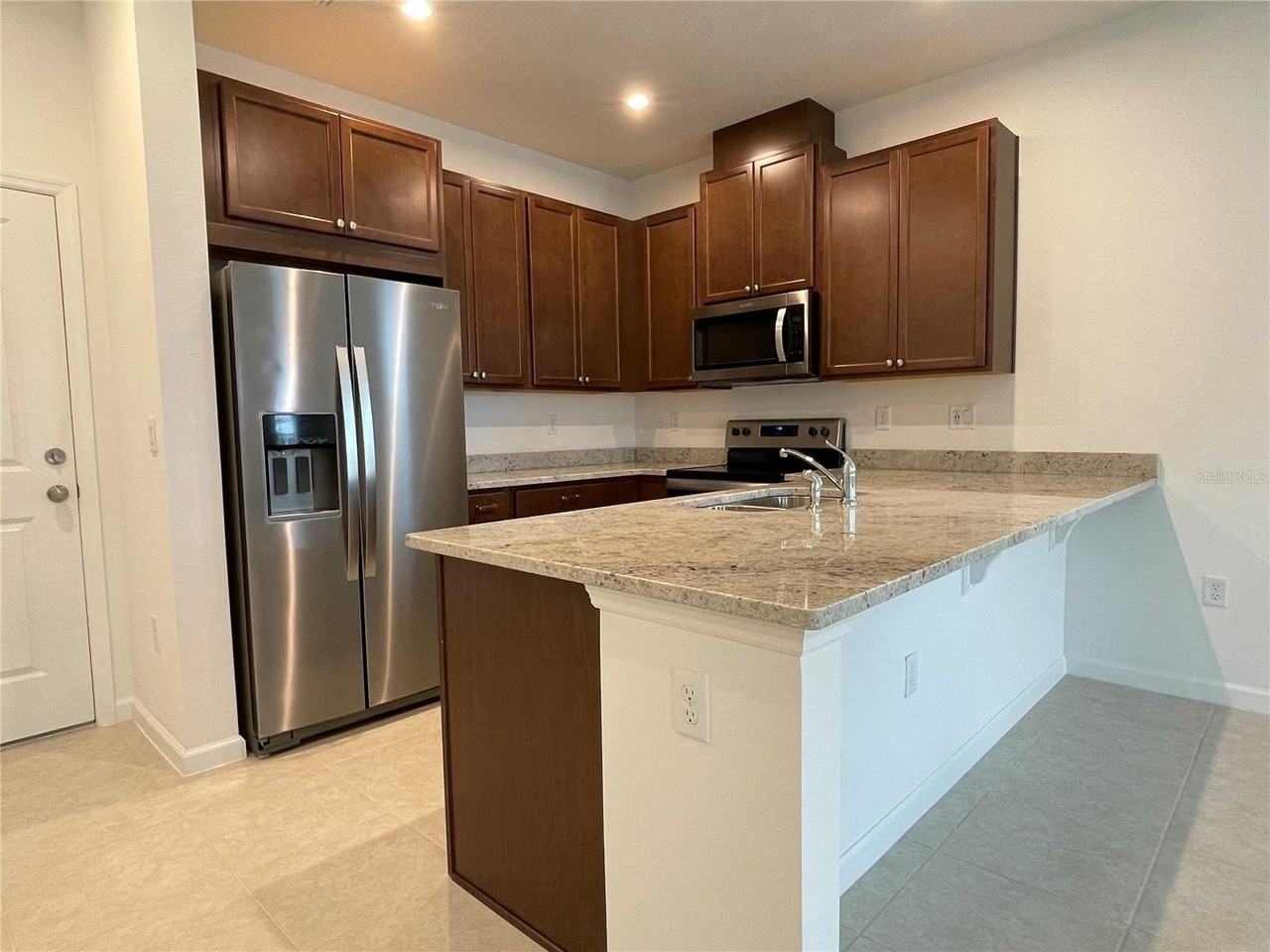 11945 Sunsail Ave - Photo 5 of 31