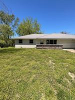 featured image of 205 E Elm St