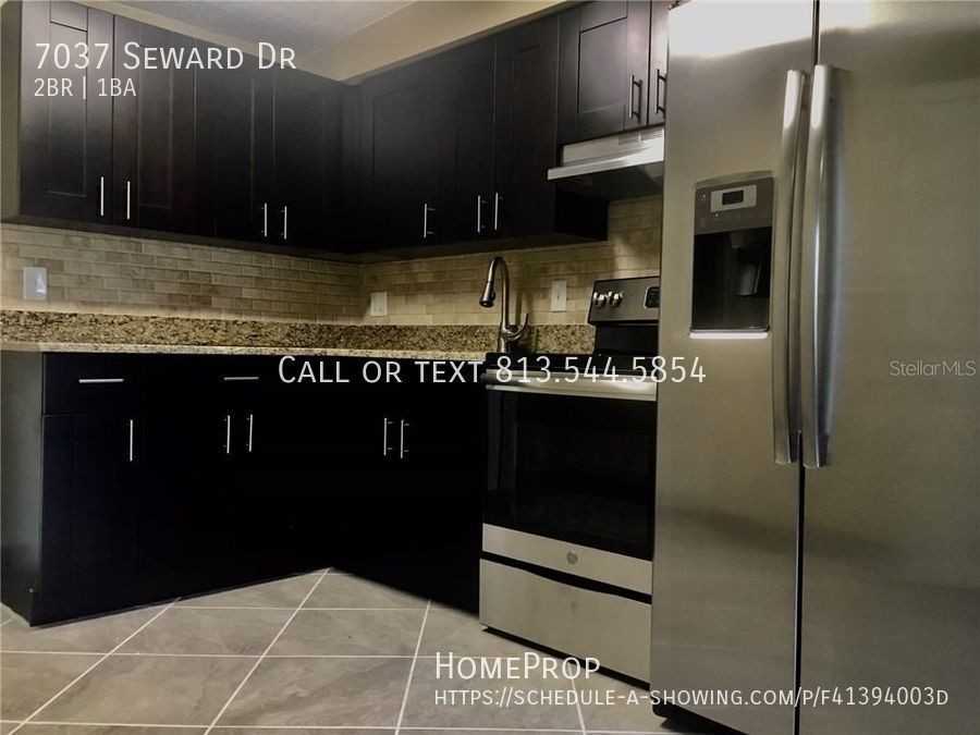 7037 Seward Dr - Photo 3 of 15