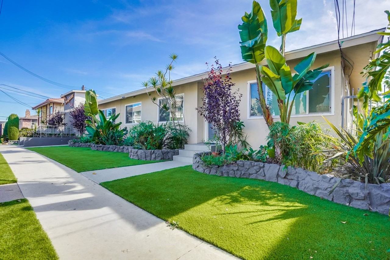 Retro Style Apartment Building with Pool and Gym - Photo 3 of 10