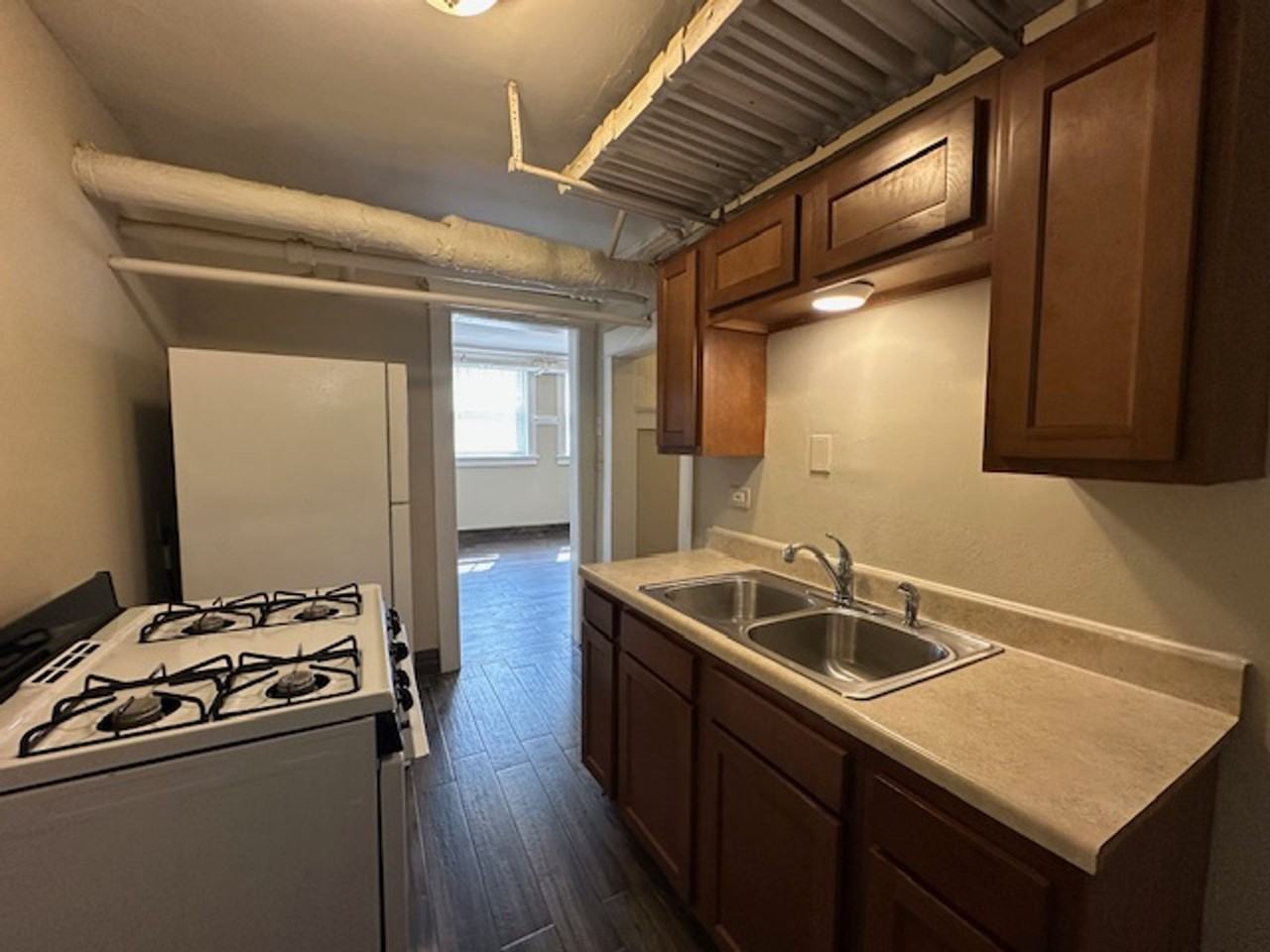 Freshly Renovated 2BR Garden Apartment Near UWM $1,350/mo – Heat + Parking Included - Photo 4 of 8