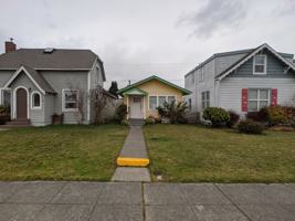 featured image of 113 W 3rd St