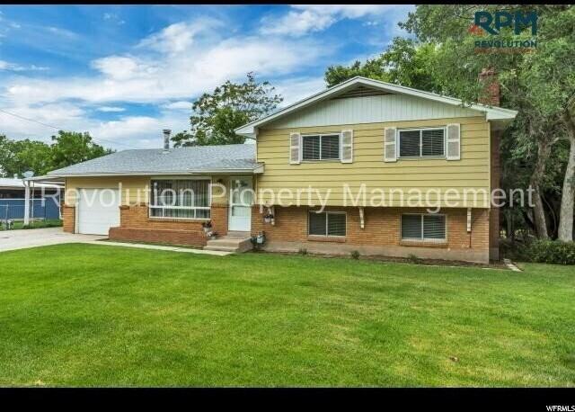 1318 E 4225 S - Photo 2 of 11