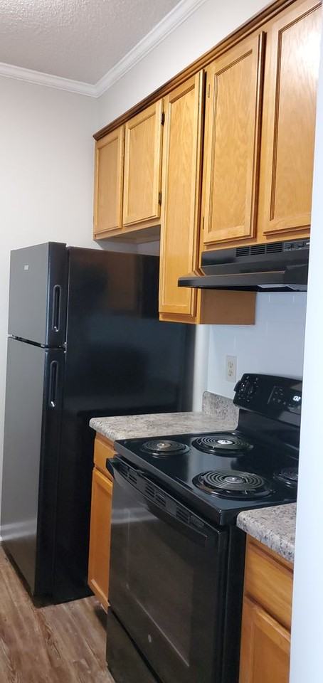 Courtyard Apartments - Photo 2 of 50