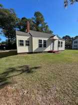 1209 E 6th St - Photo 1 of 1