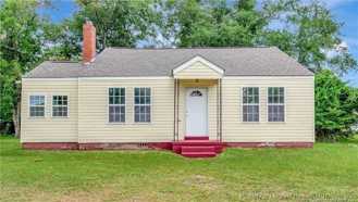 1209 E 6th St - Photo 1 of 1