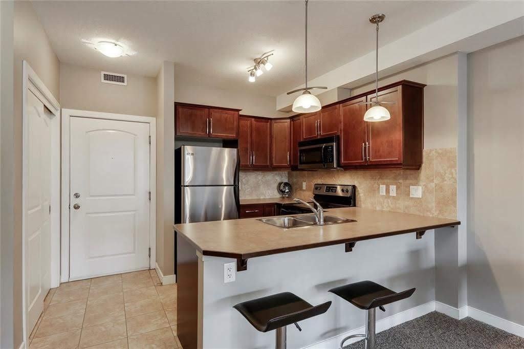 111 - 15304 Bannister Road Southeast - Photo 3 of 20