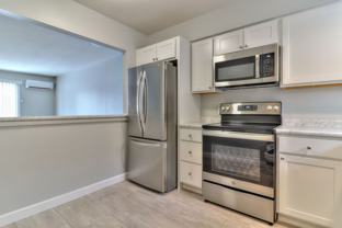 Remodeled 2 bedroom, 1.5 bath townhome with Golf Course view in Savoy.  Available soon! - Photo 1 of 1