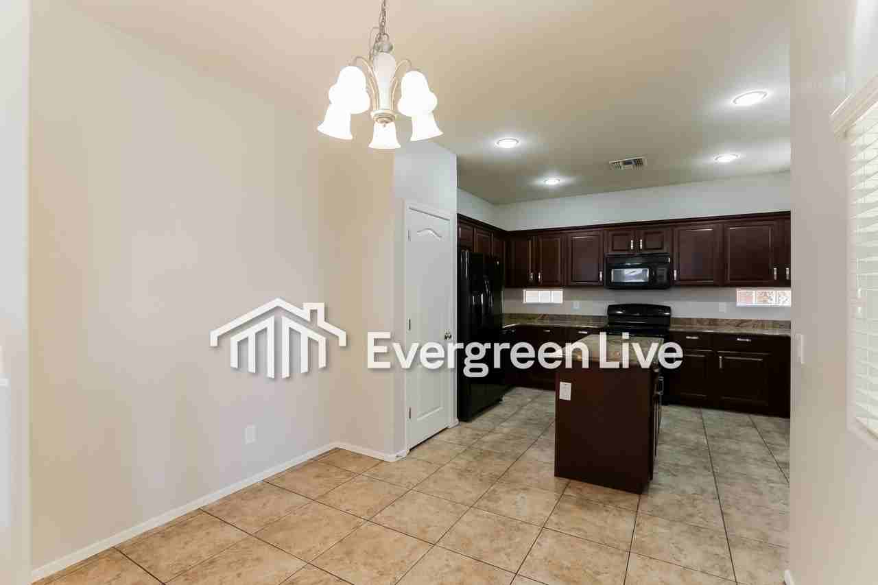 7116 S 48th Gln - Photo 6 of 19