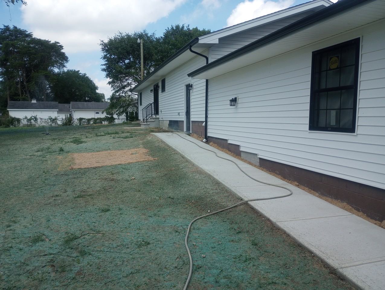 209 E 3rd St - Photo 3 of 15