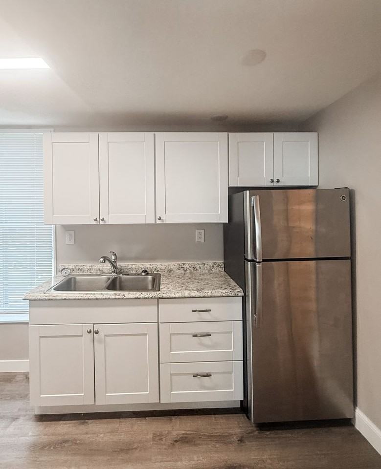 Beautifully updated apartments available in historic 4th & Gill neighborhood! - Photo 6 of 17