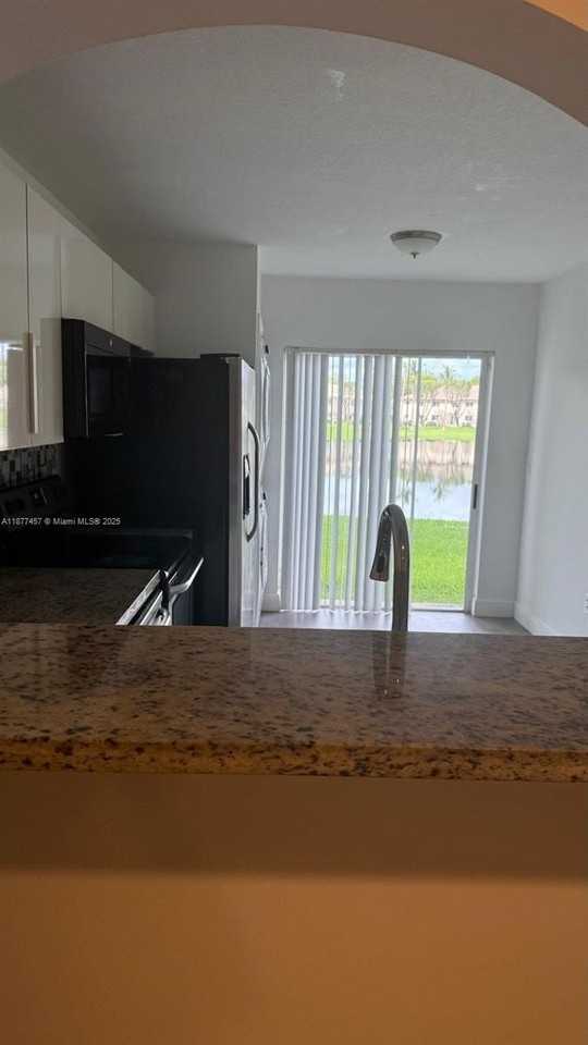 2650 Southeast 12th Place #103 - Photo 4 of 12