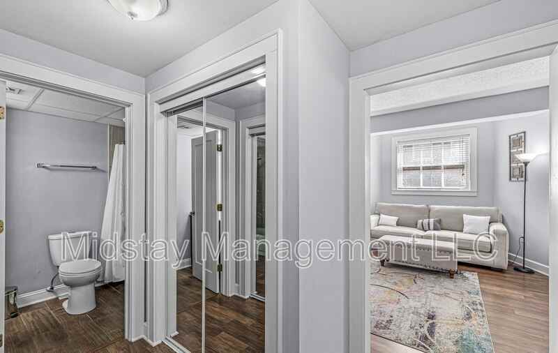 230 E 9th St - Photo 4 of 5