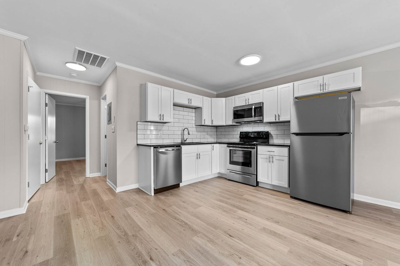 Newly Renovated Flats & Townhomes in the Heart of Angier! Pets Welcome! - Photo 3 of 37