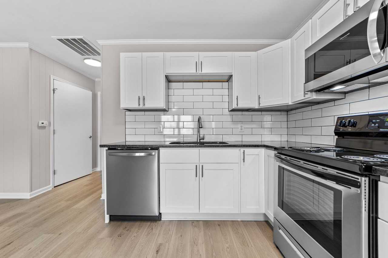 Newly Renovated Flats & Townhomes in the Heart of Angier! Pets Welcome! - Photo 4 of 37