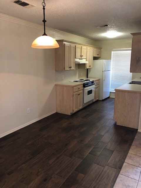 ROBERT DUPLEXES - Photo 3 of 11