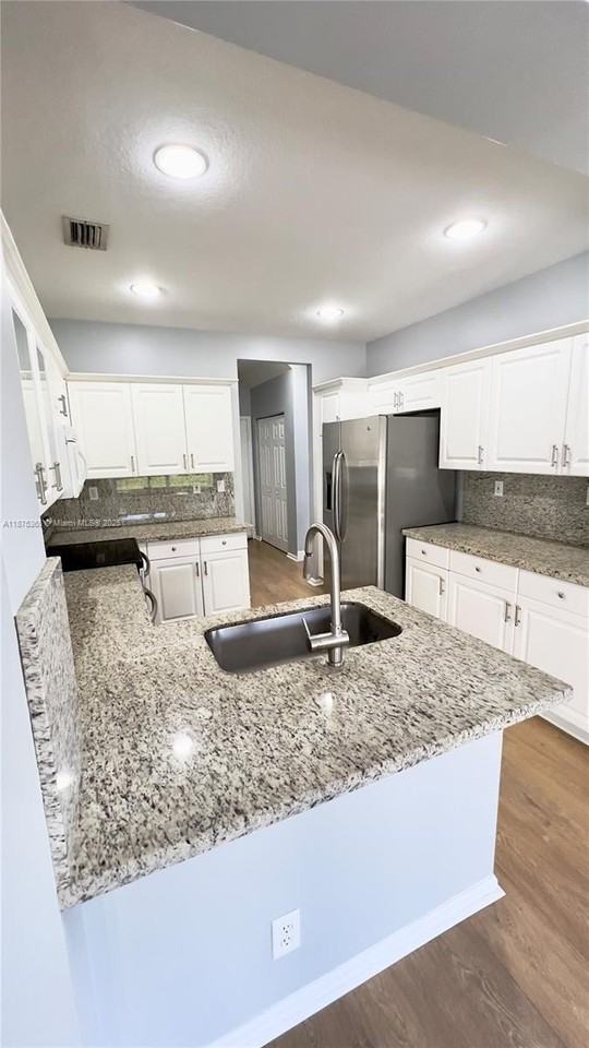 12625 Nw 56th St - Photo 5 of 29