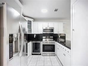 Northwest 182nd Street #104 - Photo 4 of 8